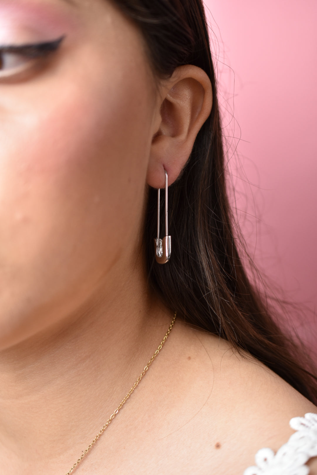 Aretes en forma de seguros